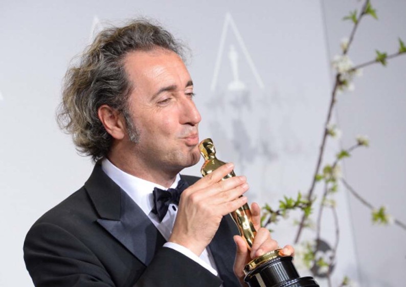 Director Paolo Sorrentino celebrates winning Best Foreign Language Film for