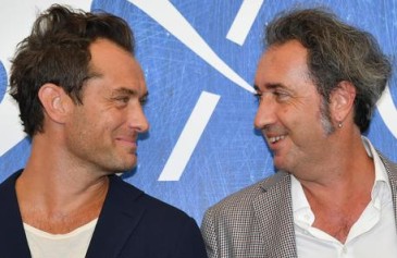 Italian director Paolo Sorrentino (R) and British actor Jude Law pose during a photocall for